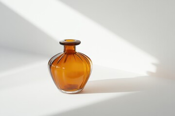 Canvas Print - Brown glass bottle on white surface