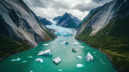 Wall Mural - aerial view of glacier, turquoise lake, and mountains.