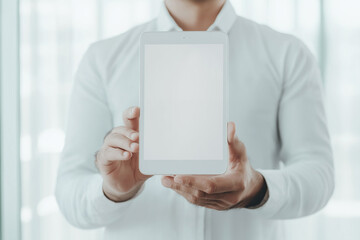 Wall Mural - businessman holding tablet