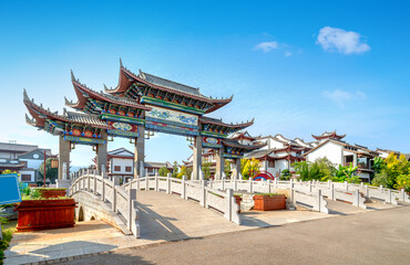 Wall Mural - The entrance archway to Mengzi Rice Noodle Town, Yunnan, China.