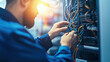 © SMART.art - Technician in modern office maintaining network server, surrounded by cables and routers, showcasing focus and professionalism in IT infrastructure management.