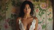 © RONNY - Woman in lace lingerie against floral background.