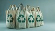 © Cik In - Eco-friendly reusable bags with recycling symbols lined up on a solid color background, promoting sustainability and environmental consciousness in shopping practices.
