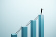 © Who is Danny - Businesswoman standing atop a bar chart holding a telescope, symbolizing vision and success.