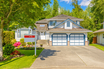 Wall Mural - Two story luxury house with beautiful summer  landscape in Vancouver, Canada, North America. Day time on June 2024.