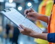 © Ytnart - A construction worker in an orange vest reviews an inspection checklist on a clipboard, highlighting the importance of safety and compliance in the workplace.