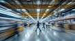© vstudio - Busy warehouse scene motion blur fast paced activity efficient logistics