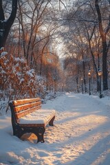 Wall Mural - A park bench surrounded by snow-covered trees, perfect for winter scenes and outdoor settings