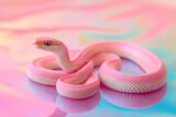 A pink snake sitting on a table