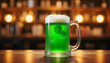 © Tatiana - Green beer in a glass mug against a blurred bar background
