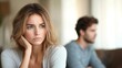 © LU - Serious sad woman thinking over a problem, man aside, meeting therapist, poor chance of getting pregnant after 40, unmet expectations, unable to handle family finances, interested in different things