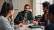 © Vitaliy - Smiling Man Leading Informal Team Discussion