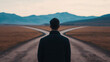 © Naree - Choosing a path man standing at a crossroads in a scenic landscape outdoor setting reflective viewpoint