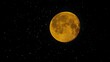 © PANGERANDESIGN - Large amber full moon in a starry night sky.
