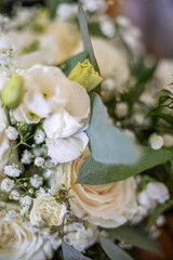 Wall Mural - Close-up of white roses, greenery, and delicate baby's breath