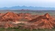 © Big9869 - Atacama Desert's Red Rock Formations and Distant Mountains