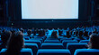 © Badisaba - A movie theater showcases a large screen with people