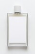 © Elena - top-down view of minimalist fragrance bottle featuring blank white sticker arranged in sleek modern design on pure
