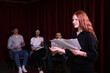 © New Africa - Professional actors reading their scripts during rehearsal in theatre