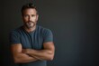 © Yuliya - Confident and Composed: A portrait of a mature man with a strong gaze and a determined expression, radiating confidence and a sense of self-assurance.