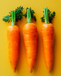 © Kaio - A photo of three carrots with an orange background