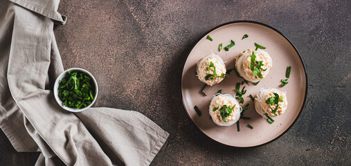 Wall Mural - Snack of mushrooms, funchose and fish caviar on a plate on the table top view web banner