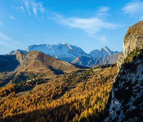 Wall Mural - Autumn alpine Dolomites mountain view from Falzarego Pass to Marmolada massif and Glacier.