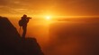 © Chumporn - Silhouetted Photographer Captures Breathtaking Sunrise from Cliff Edge