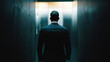 © MP_Artworks - A businessman in a dark suit walks into a sleek office with a glass wall, holding a tablet, ready for a meeting. The modern workspace reflects professionalism and success.