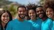 © BrightWhite - Group of diverse young volunteers smiling joyfully, standing together outdoors in matching blue t-shirts, showcasing community spirit and teamwork, supporting local charity event.
