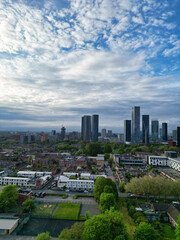 Wall Mural - Aerial View of Buildings at Greater Manchester Central City, Northwest of England, United Kingdom. Aerial View Footage Was Captured with Drone's Camera on May 4th, 2024 During Sunset Time.