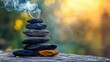 © NurNazira - Tranquil Stacked Stones with Incense Smoke