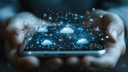 Wall Mural - a hand holding a cell phone with a blue cloud on it. the clouds are connected to each other and to t