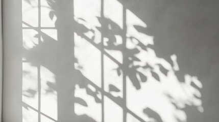 Wall Mural - elegant shadows of leaves cast on a minimalist wall, creating a serene and calming atmosphere in bri