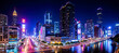 © Celt Studio - Night cityscape with illuminated skyscrapers, busy streets, and vibrant lights reflecting on water, showcasing urban life and modern architecture in bustling metropolis