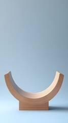 Wall Mural - a curved wooden podium with a polished finish and an empty space for display, set against a soft blu