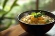 © Espresso - A steaming bowl of savory noodles topped with fresh herbs, encapsulating warmth and comfort.