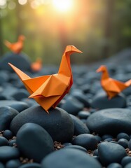 Wall Mural - A group of orange origami birds sitting on top of a pile of rocks