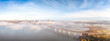 © Westend61 - Aerial view of the bridges crossing the Firth of Forth estuary in Scotland as morning fog clears.