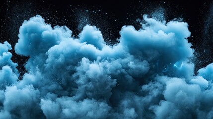 Wall Mural - Thick, pale blue clouds of smoke over a black background. 