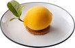 © T K - A refreshing lemon-shaped dessert with a vibrant yellow shell, realistic texture, and leafy garnish. It sits atop a crispy cookie base, blending artistic presentation with tangy, sweet flavors