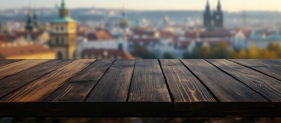 Wall Mural - dark wooden table surface against a blurred bokeh background perfect for product display and creativ
