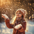© Zeljko - Happy child joyfully playing in the snow with parents in a winter forest on a snowy day