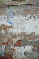 Wall Mural - Old vintage wall bricks background with cracked paint