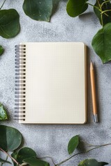Wall Mural - a notebook with a pencil on top of it. the notebook is open to a blank page. the pencil is on the ri