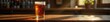 © Kathy - Half-pint of amber ale, condensation, polished wood, traditional, amber, setting