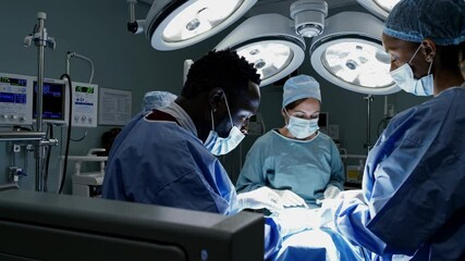 Poster - Surgeons perform a complex operation in a modern surgical theater with advanced lighting and equipment
