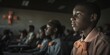 © CoreVisuals - World Cancer Day education concept. Children watching a presentation in a dimly lit room.