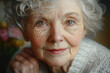 © hkjdesign - Close-up portrait of an elderly woman, showing the beauty of aging and wrinkles.