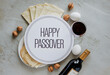 © Arshadul - happy passover plate with wine, matzah bread, and festive decoration, representing joy and tradition